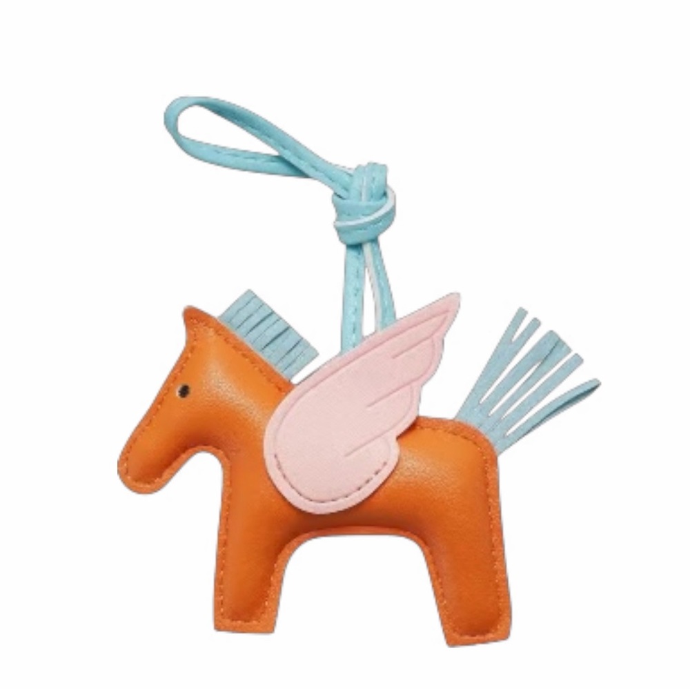 TU.LX Orange Horse-Shaped Bag Charm with pink and blue accent  NWT